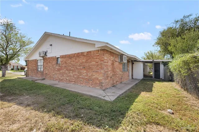 a view of a backyard of the house
