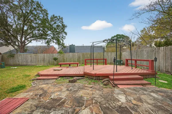 a view of yard with swimming pool