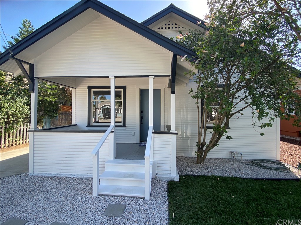 3634 Taft Street Riverside, CA 92503 - Photo 1 of 1 a front view of a house with a yard