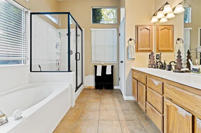 a bathroom with a bathtub and a sink