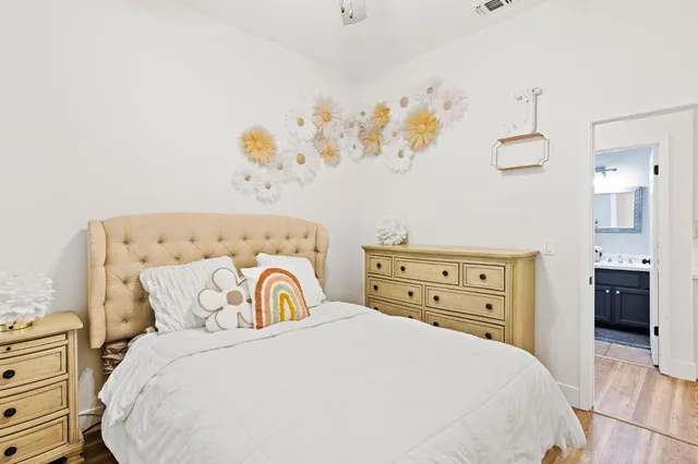 a bedroom with a bed and a closet