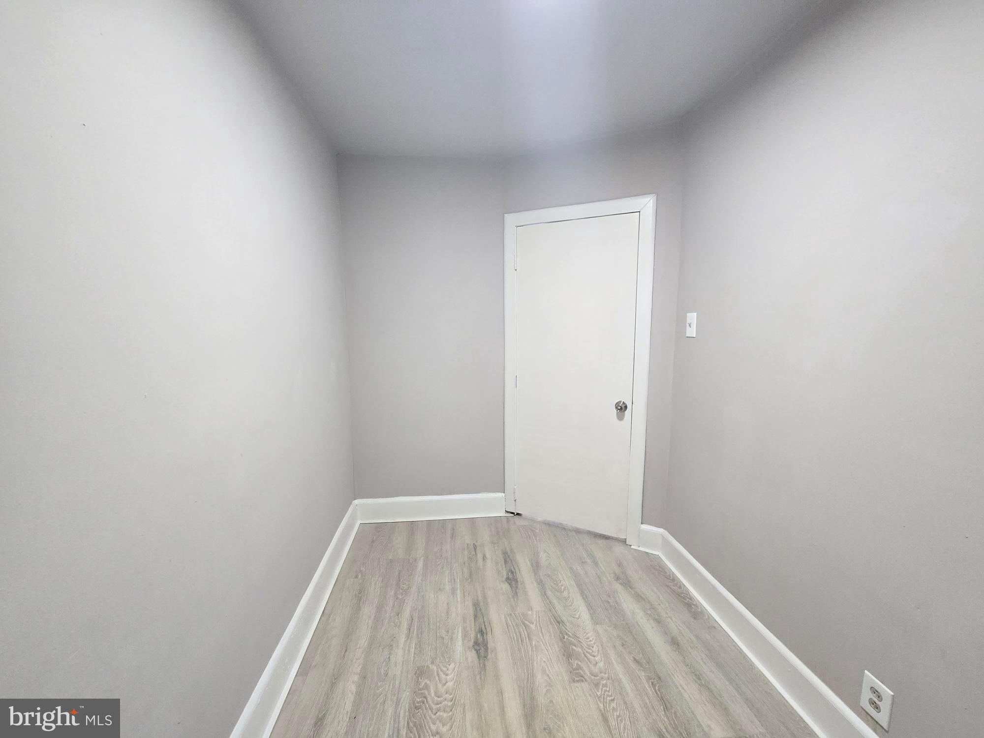 2642 South 67th Street Philadelphia, PA 19142 - Photo 15 of 23 a view of a room with wooden floor