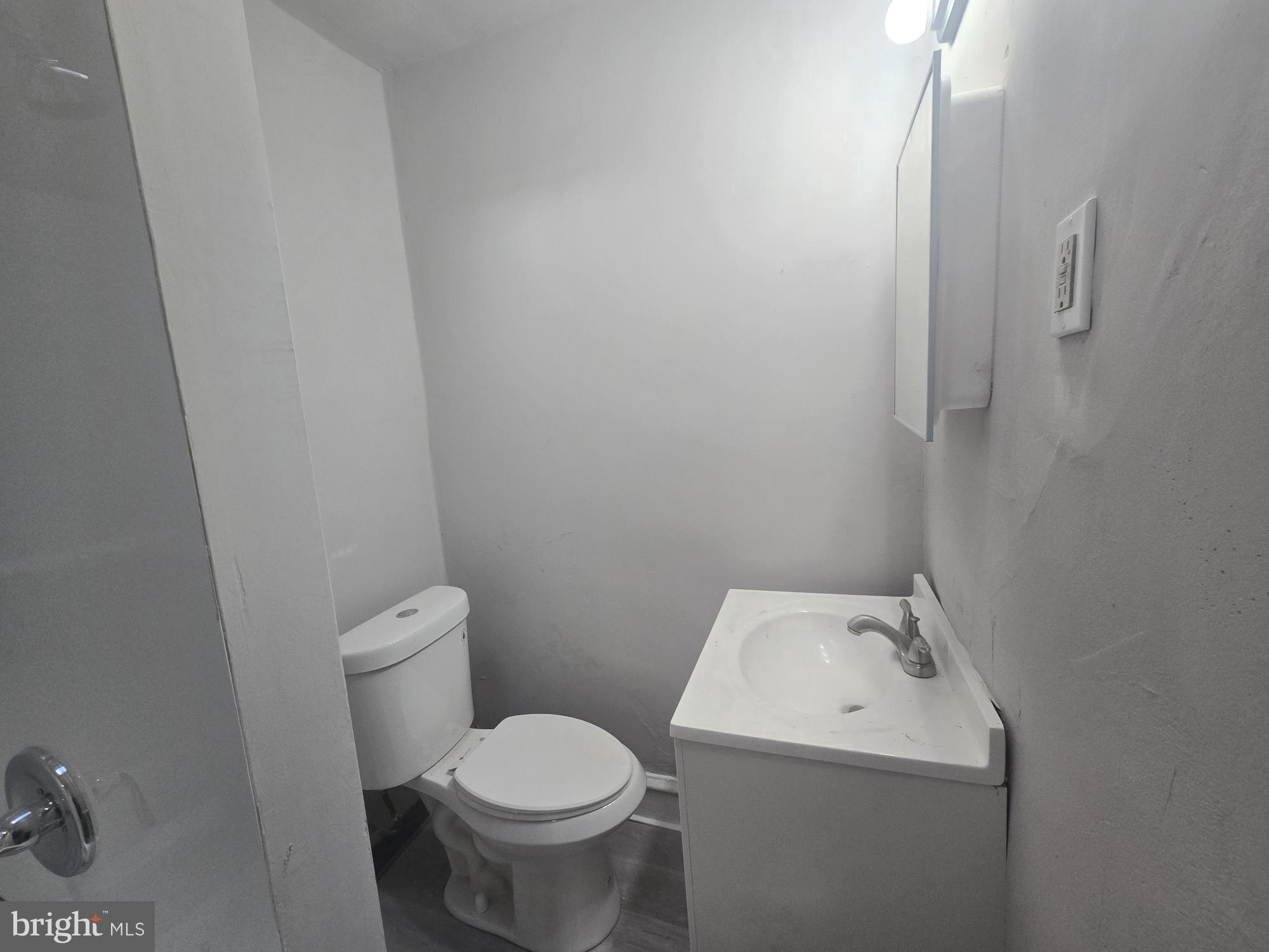 2642 South 67th Street Philadelphia, PA 19142 - Photo 18 of 23 a white toilet sitting next to a white sink