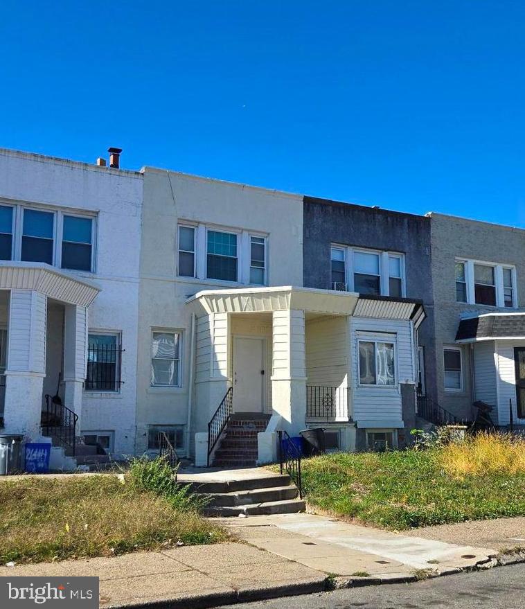2642 South 67th Street Philadelphia, PA 19142 - Photo 23 of 23 a front view of a house with garden