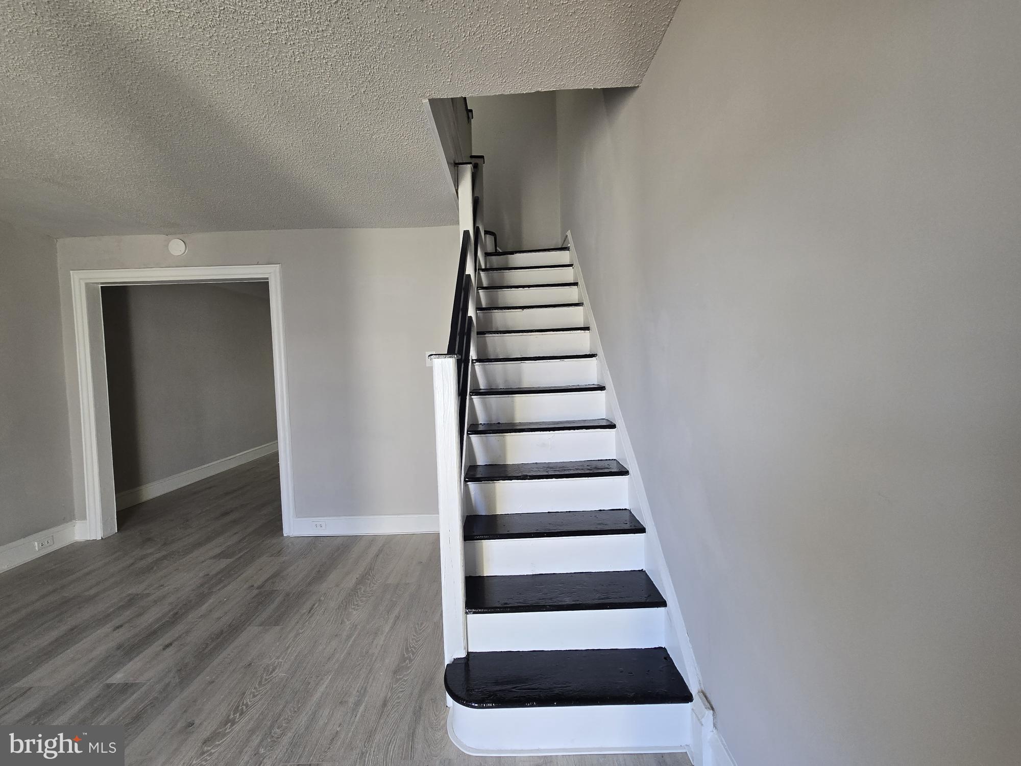 2642 South 67th Street Philadelphia, PA 19142 - Photo 8 of 23 a view of entryway with wooden floor