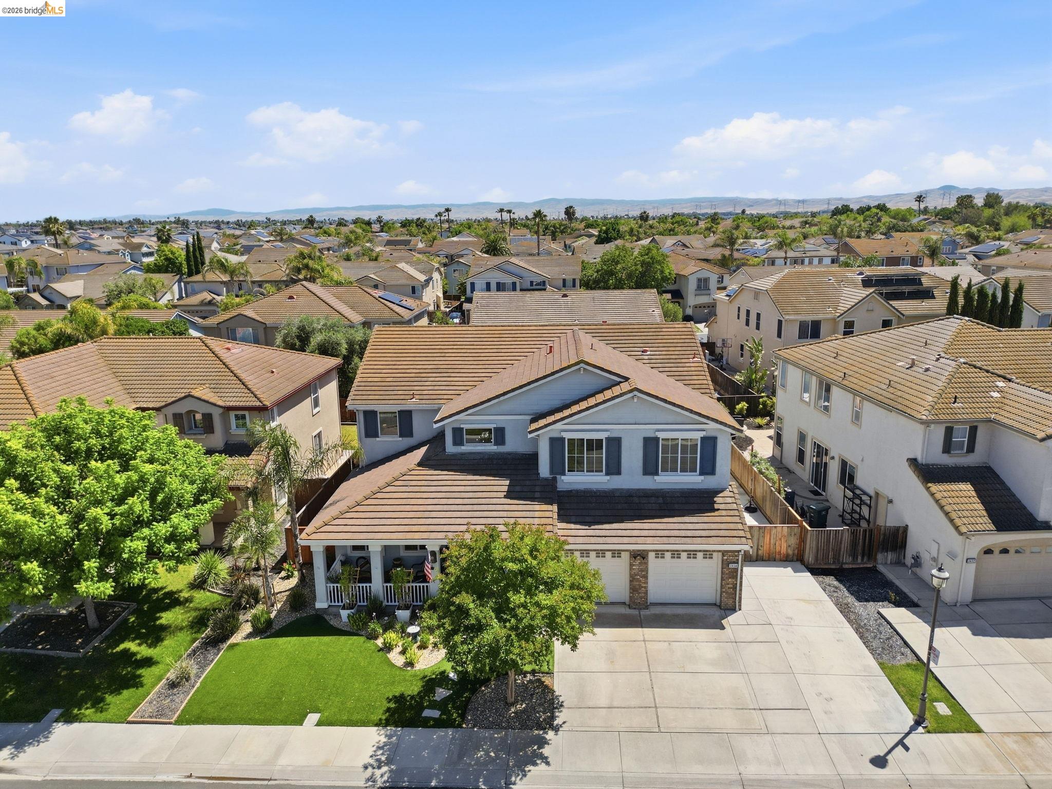 3438 Keystone Loop Discovery Bay, CA 94505 - Photo 51 of 57 an aerial view of a house with a yard