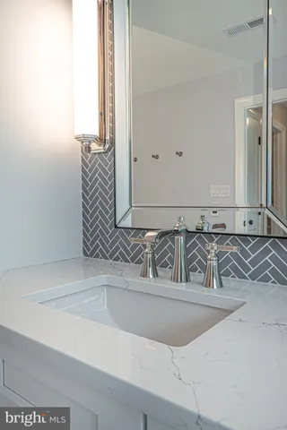 a bath tub sitting in front of a window