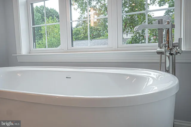 a bathroom with a bathtub