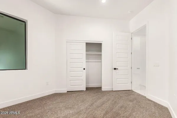 an empty room with closet