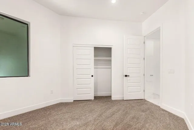 an empty room with closet