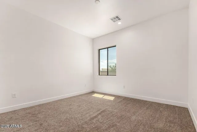 an empty room with a window