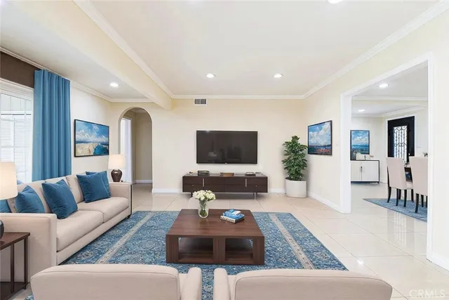 a living room with furniture and a couch