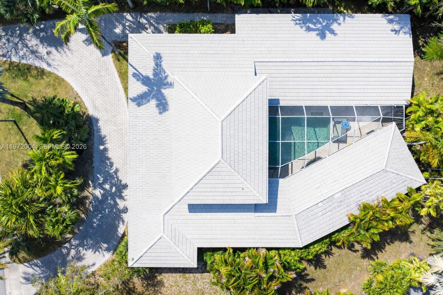 4570 Sabal Palm Road Miami, FL 33137 - Photo 2 of 3 a view of house with pool