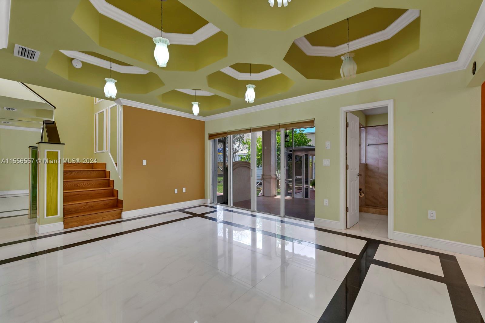 4014 Southwest 144th Place Miami, FL 33175 - Photo 14 of 50 a view of an entryway with a carpet