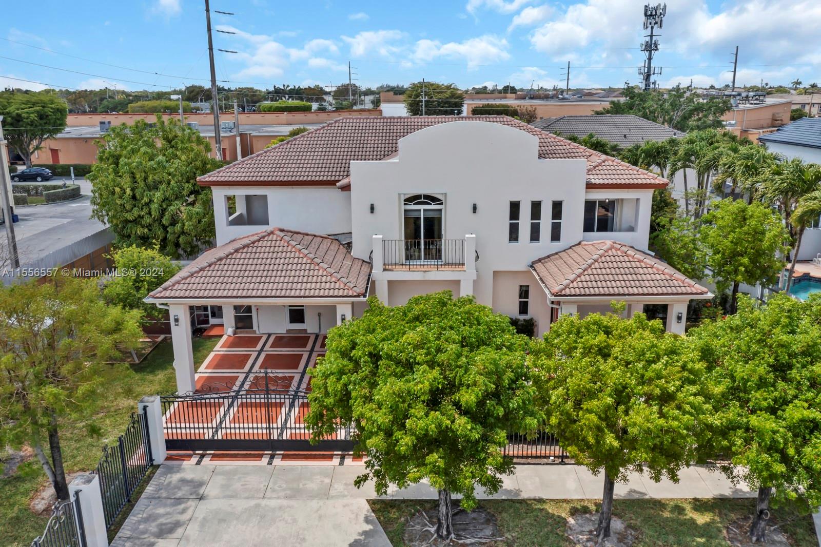 4014 Southwest 144th Place Miami, FL 33175 - Photo 2 of 50 a aerial view of a house with a yard and potted plants