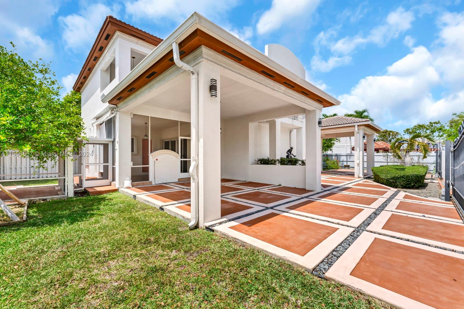 4014 Southwest 144th Place Miami, FL 33175 - Photo 6 of 50 a front view of a house with a yard