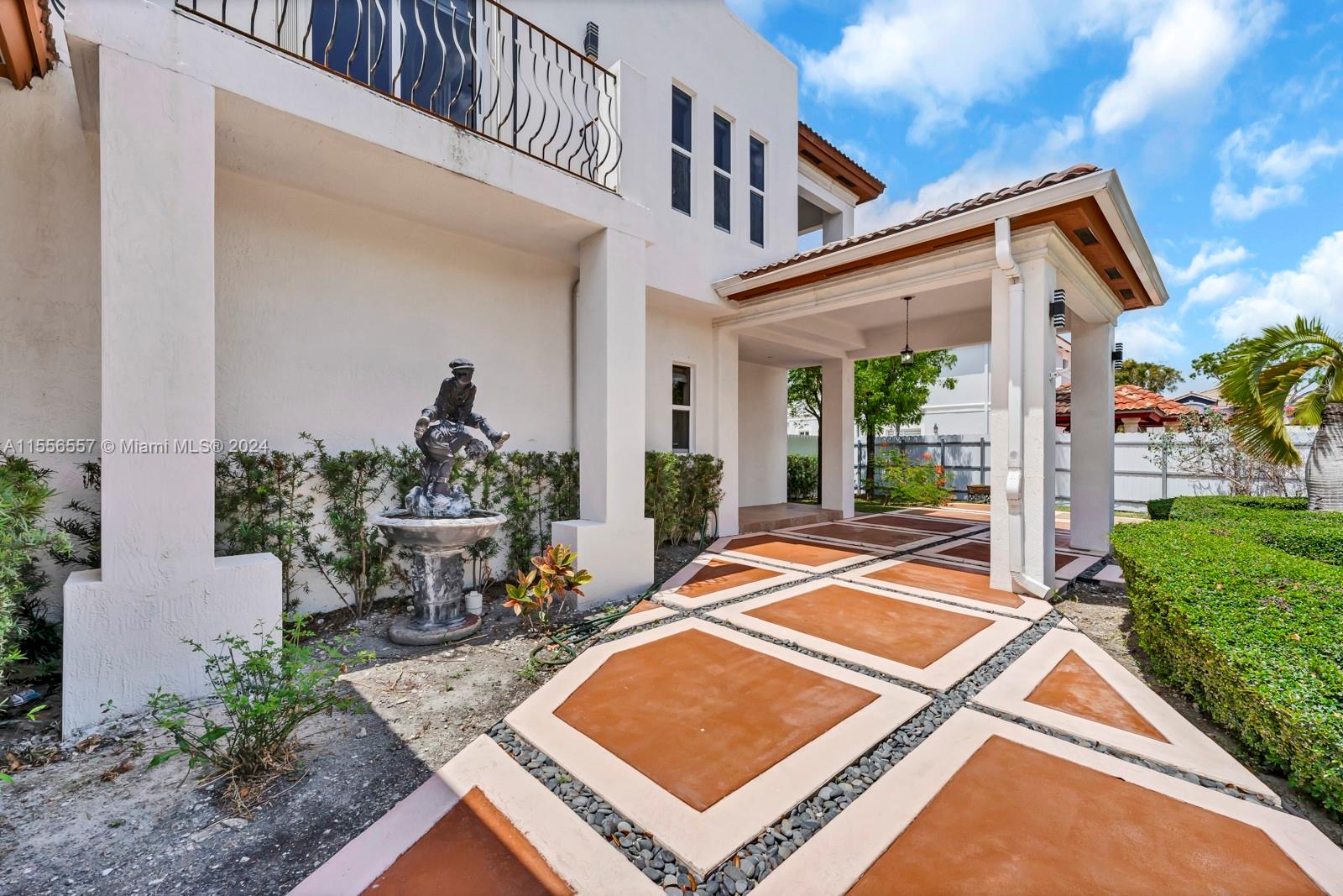 4014 Southwest 144th Place Miami, FL 33175 - Photo 7 of 50 a view of a house with backyard sitting area and garden