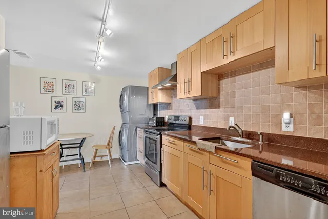 a view of a livingroom with furniture and a table