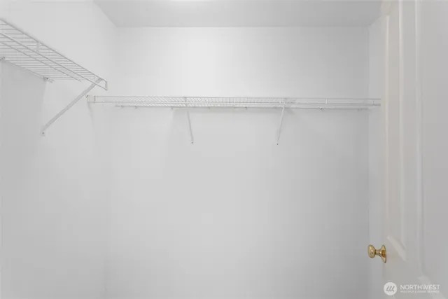 a view of an empty walk in closet