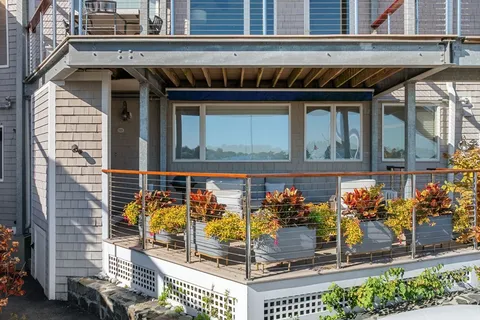 a view of a porch with seating space
