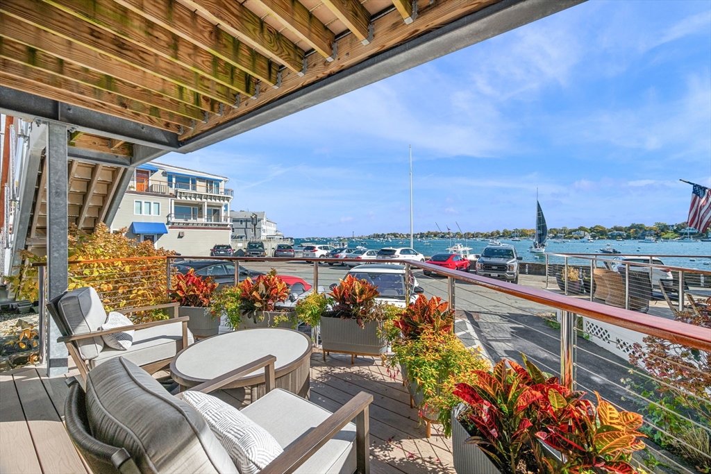 24 Lee Street, Unit B10 Marblehead, MA 01945 - Photo 4 of 33 a view of a balcony with chairs