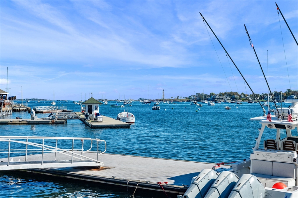 24 Lee Street, Unit B10 Marblehead, MA 01945 - Photo 5 of 33 a view of a lake with couches chairs
