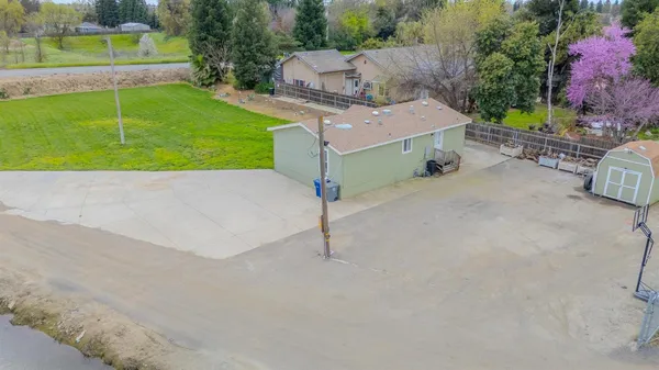a front view of house with yard and entertaining space