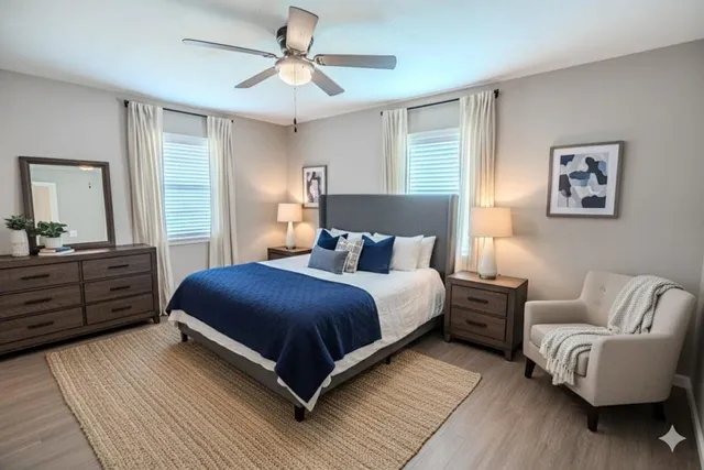 a bedroom with a bed and a couch