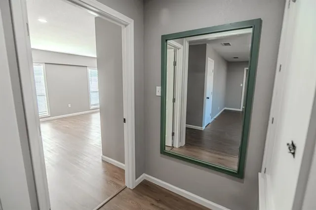 a kitchen with a sink and a stove top oven