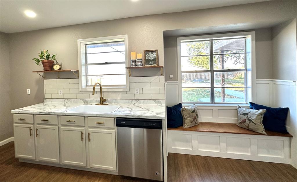108 Gettysburg Drive Comanche, TX 76442 - Photo 4 of 39 a kitchen with a sink and large window