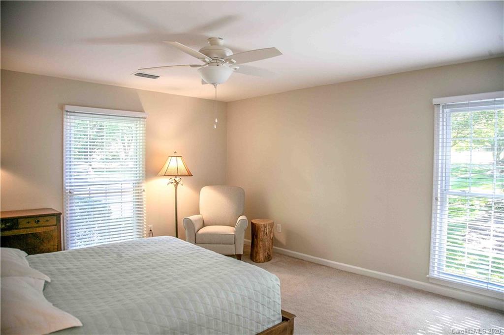 4417 Simsbury Road Charlotte, NC 28226 - Photo 33 of 42 a bedroom with a bed and a window