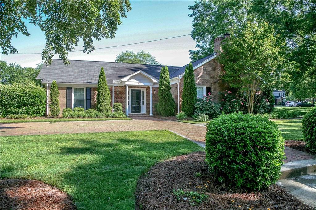 4417 Simsbury Road Charlotte, NC 28226 - Photo 41 of 42 a front view of a house with a yard