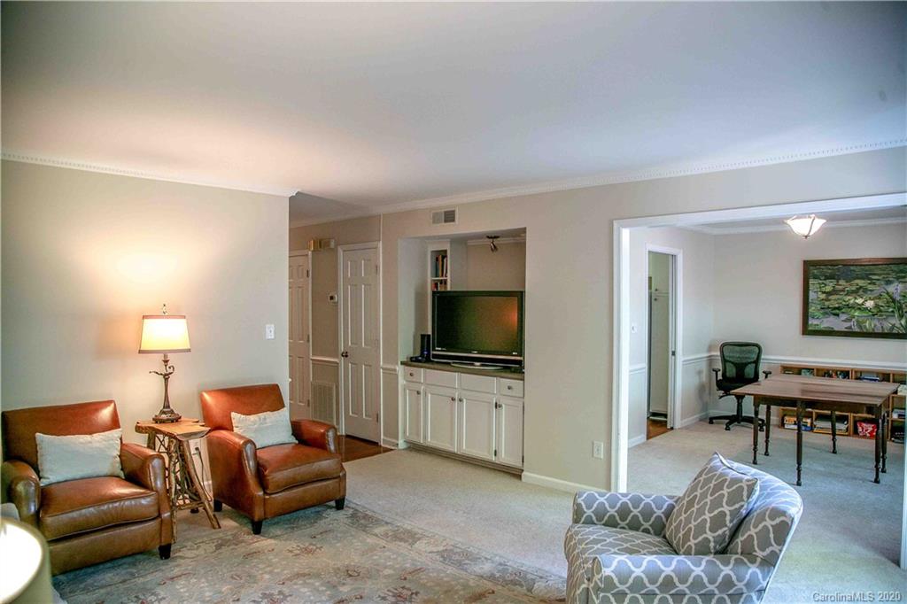 4417 Simsbury Road Charlotte, NC 28226 - Photo 6 of 42 a living room with furniture and a flat screen tv
