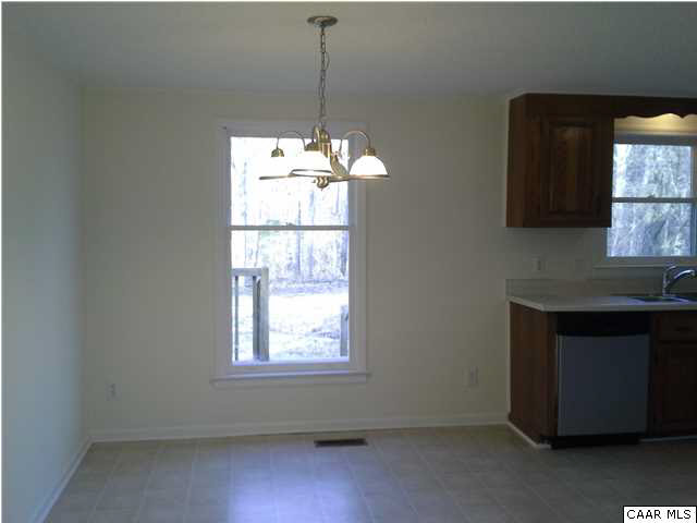 94 Carnation Road Ruckersville, VA 22968 - Photo 4 of 34 a kitchen with window and a sink