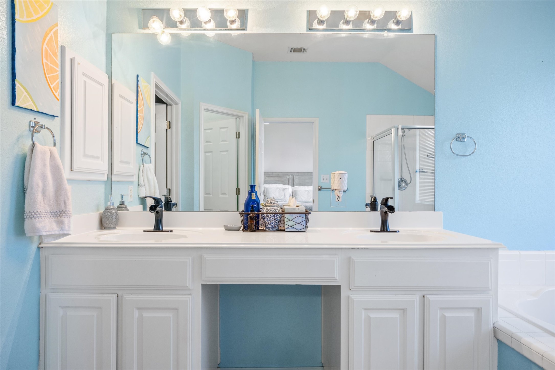 122 Summers Green Georgetown, TX 78633 - Photo 4 of 22 Bathroom with double vanity, a bath, and a shower stall