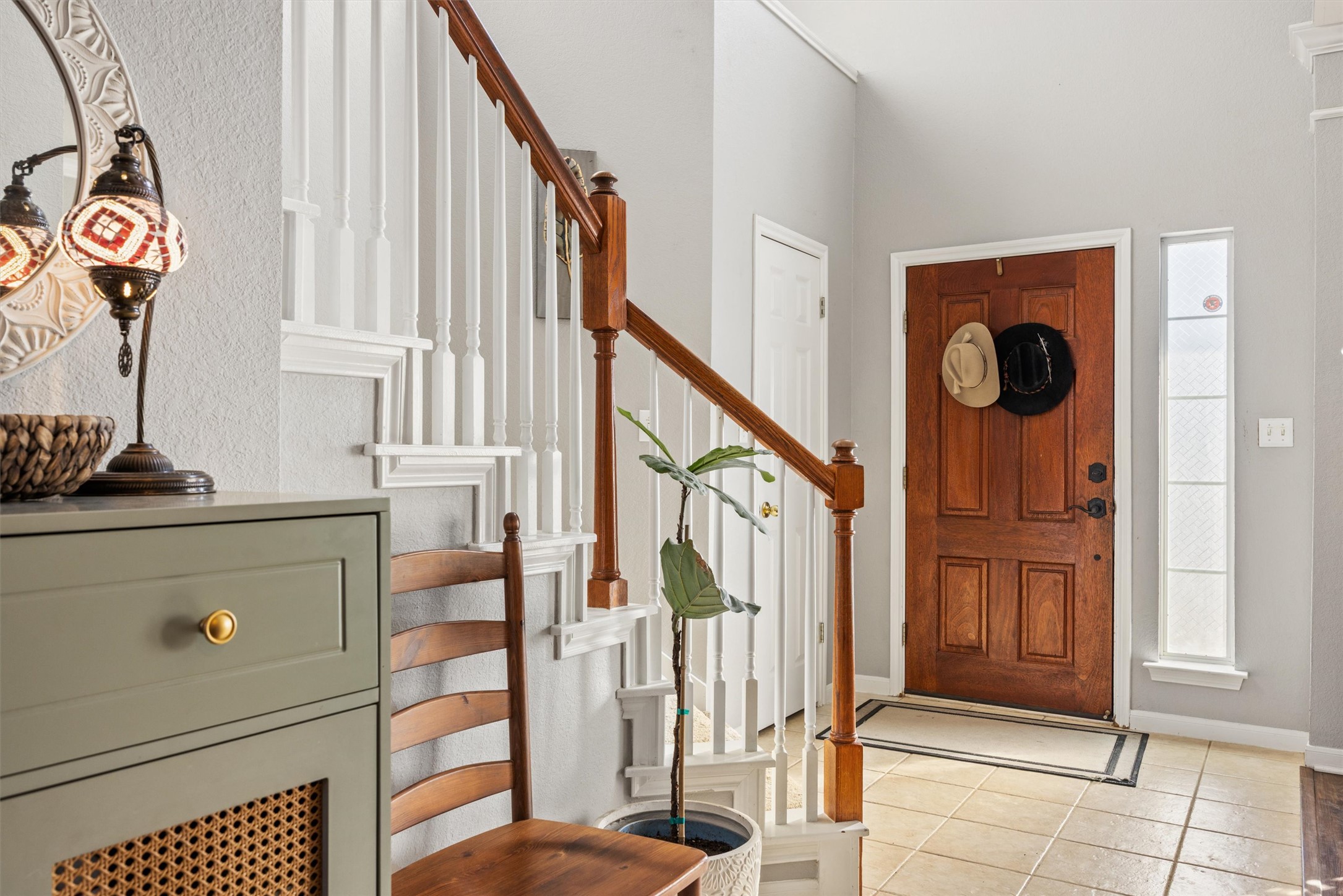 122 Summers Green Georgetown, TX 78633 - Photo 6 of 22 Foyer with stairs and light tile patterned floors