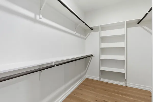 a view of an empty walk in closet