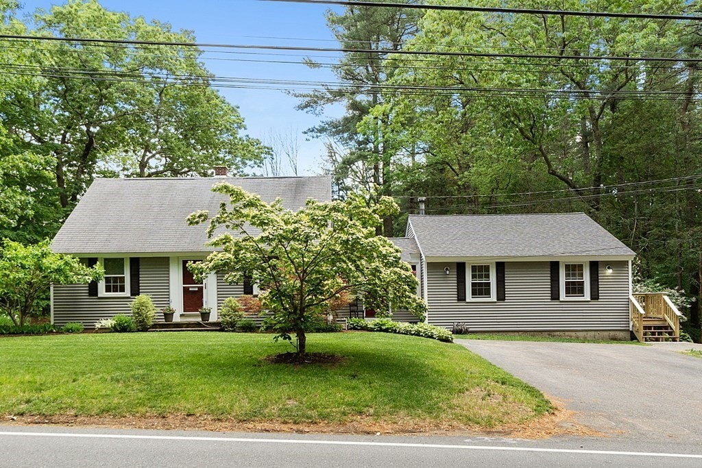 187 Red Acre Road Stow, MA 01775 - Photo 1 of 27 front view of a house and a yard