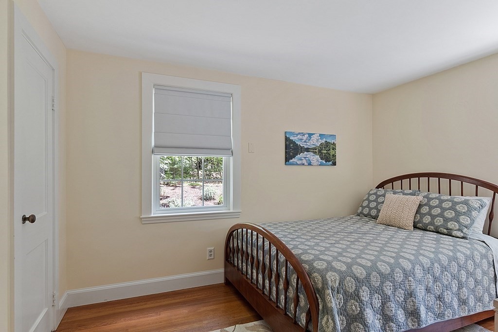 187 Red Acre Road Stow, MA 01775 - Photo 11 of 27 a bedroom with a bed and a window