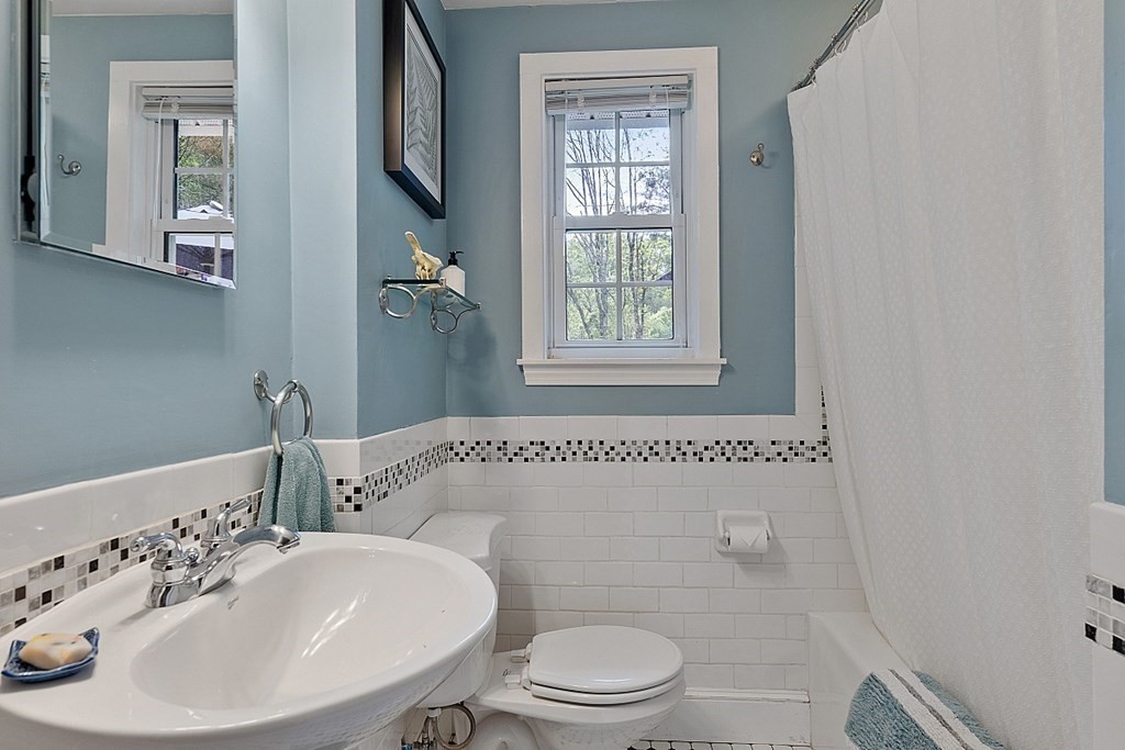 187 Red Acre Road Stow, MA 01775 - Photo 12 of 27 a bathroom with a sink a toilet and a mirror