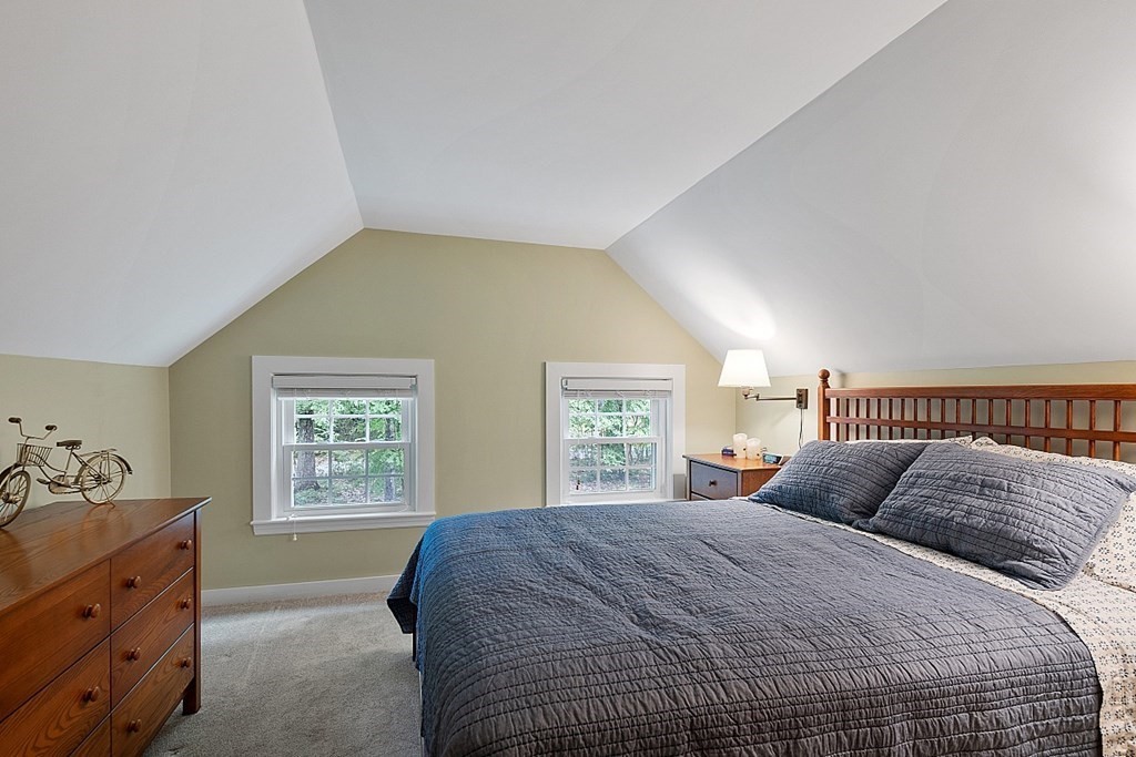 187 Red Acre Road Stow, MA 01775 - Photo 14 of 27 a bedroom with a large bed and a window