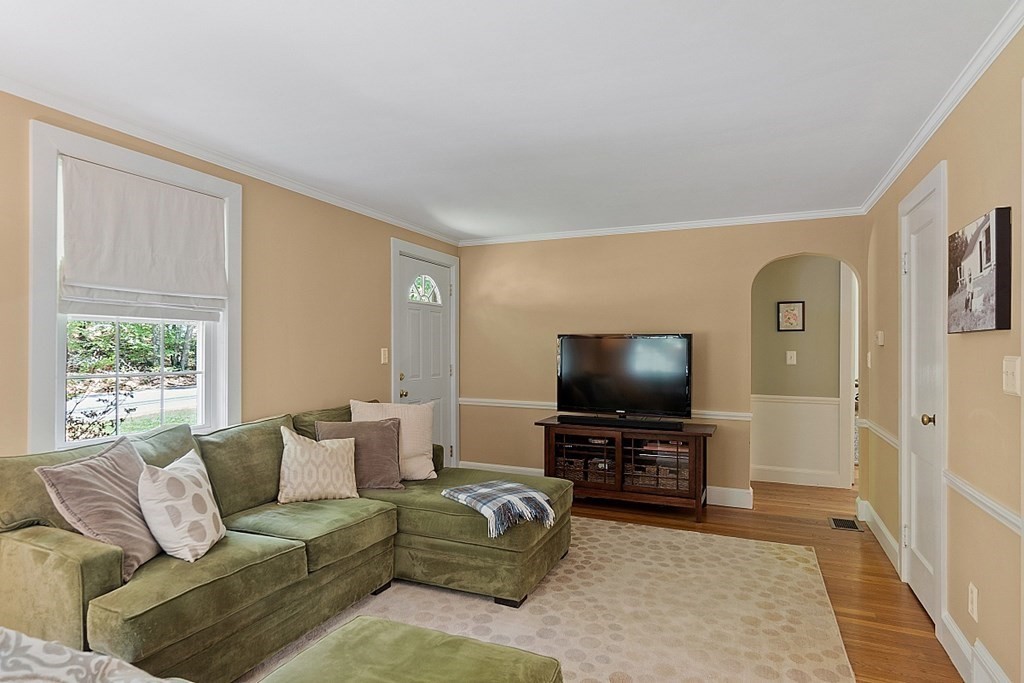 187 Red Acre Road Stow, MA 01775 - Photo 3 of 27 a living room with furniture and a flat screen tv