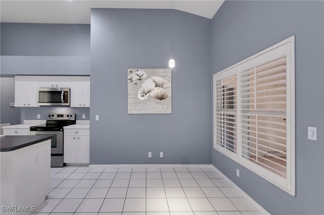 22203 Seashore Circle Estero, FL 33928 - Photo 21 of 45 a view of a kitchen with electric appliances