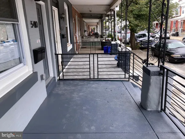 a view of outdoor space with seating and lots of stairs