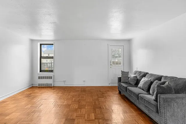 a view of livingroom with furniture and window