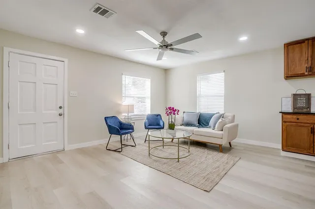 a kitchen with stainless steel appliances granite countertop a stove and a sink