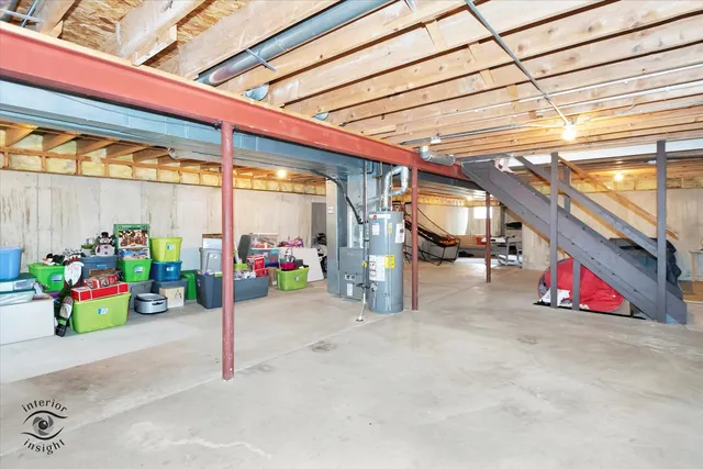 a view of a roof deck with table and chairs a barbeque with wooden floor and fence