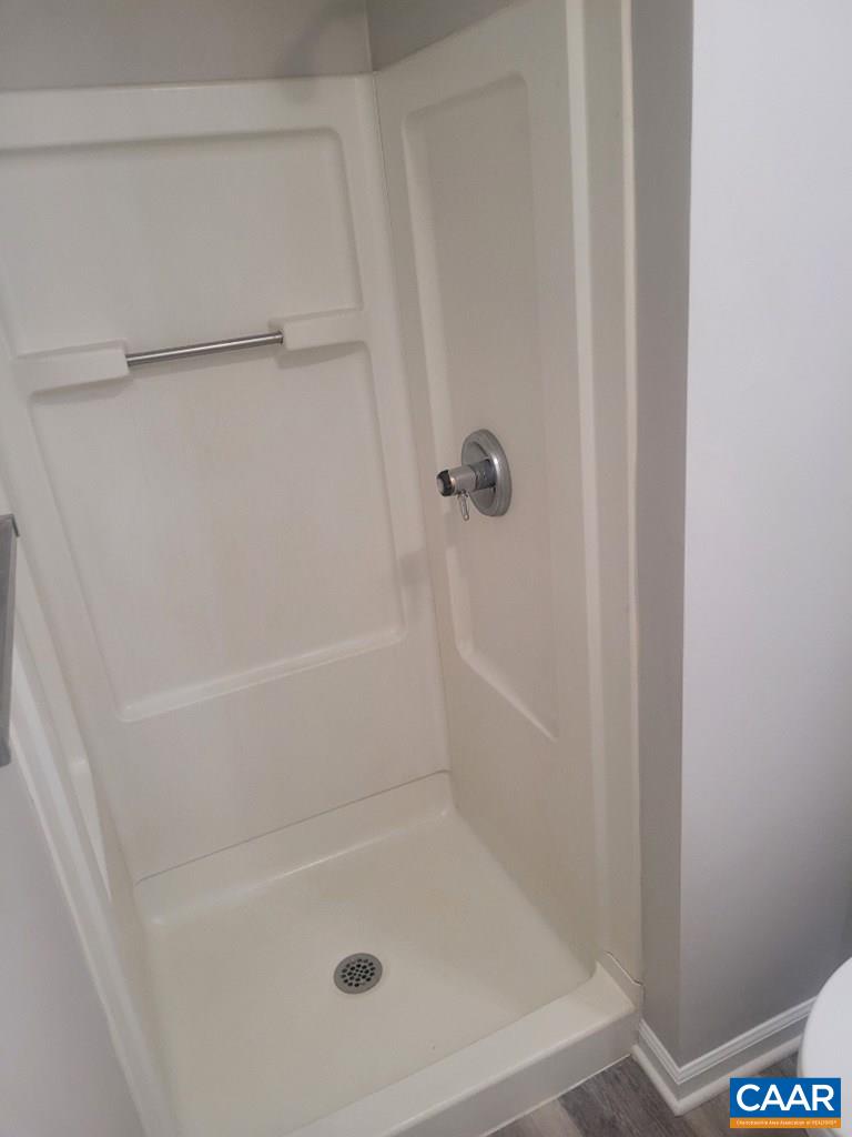 906 Equestrian Trail Road New Canton, VA 23123 - Photo 14 of 22 a close up of a bathtub