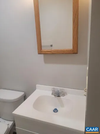 a bathroom with a sink and a toilet