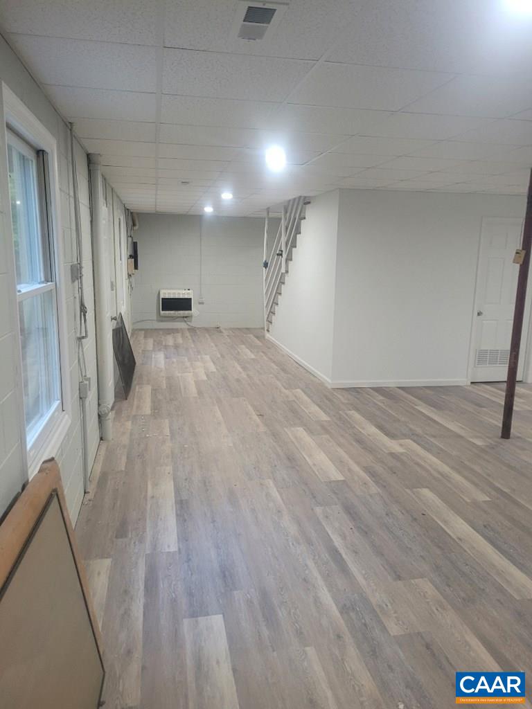 906 Equestrian Trail Road New Canton, VA 23123 - Photo 19 of 22 a view of empty room with wooden floor